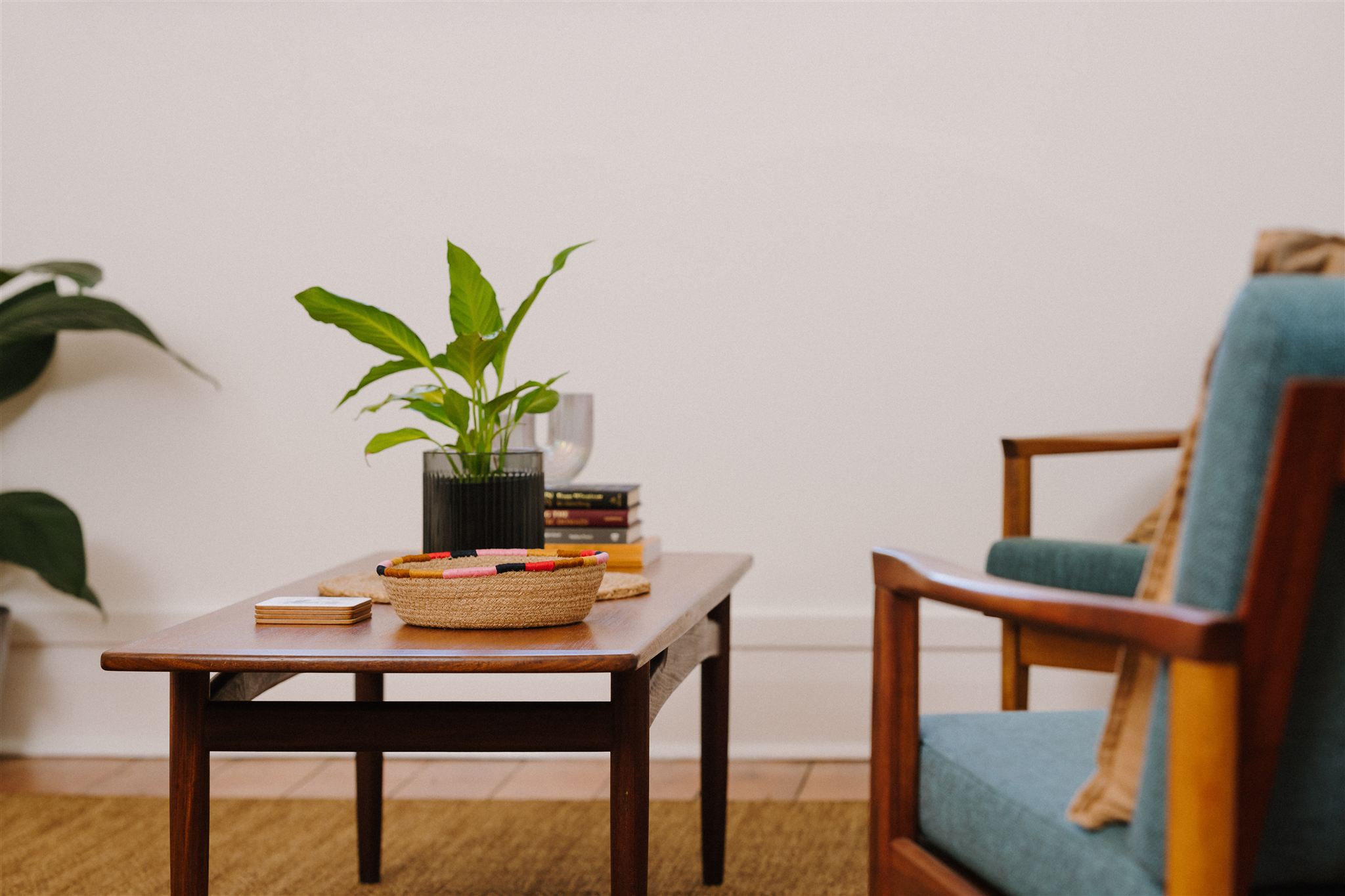 Yarra Clinic waiting room — warm timber furniture and greenery